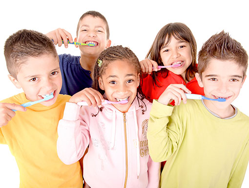 Group-of-Children-Brushing-Teeth